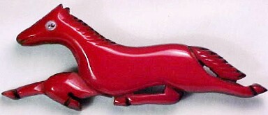 BP94 red bakelite on wood running horse pin